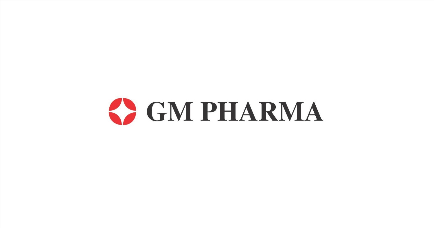 Logo of GM Pharma featuring a red circular emblem with a stylized design next to the text.